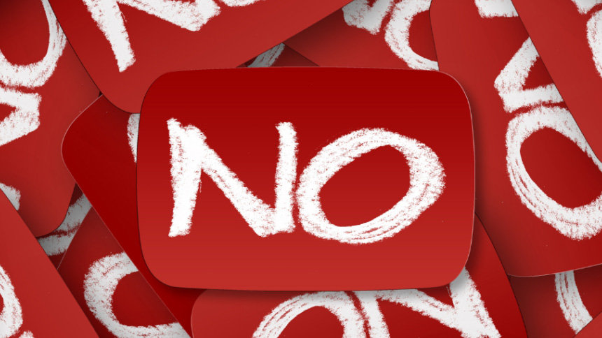 Red cards with "NO" written in white chalk