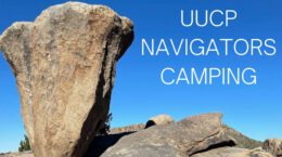 standing rock against blue sky | "UUCP NAVIGATORS CAMPING"