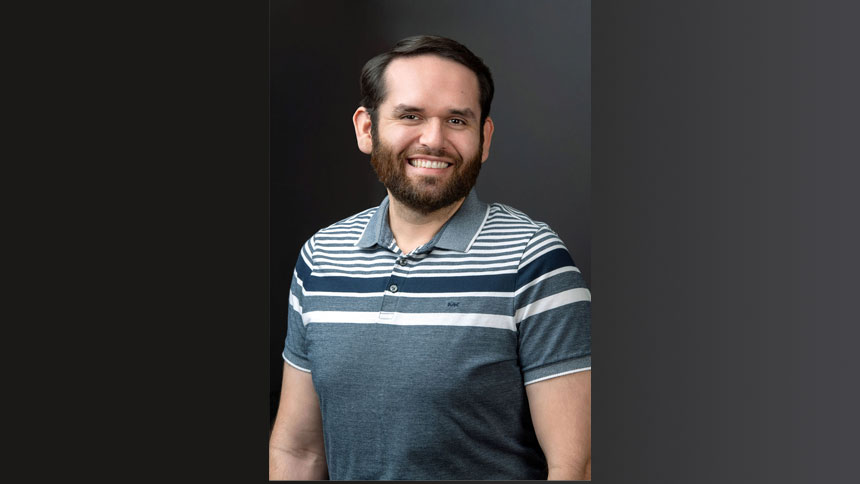 A pic of our new intern Isaac Castro with a muted gradient background